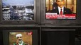 Las imágenes de Osama bin Laden y de Barack Obama, presidente de EEUU, comparten protagonismo en los televisores de una tienda de electrodomésticos de Kabul.