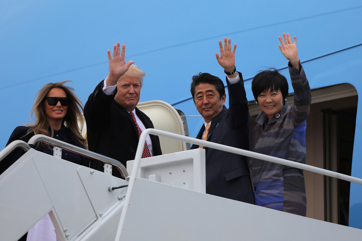 president-donald-trump-and-his-wife-melania-wave-with-japanese-prime-minister-shinzo-abe-2ndr-and-his-wife-akie-abe-while-boarding-air-force-one-they-depart-for-palm-beach-florida-joint-base-andrews-maryland-1486759519605.jpg