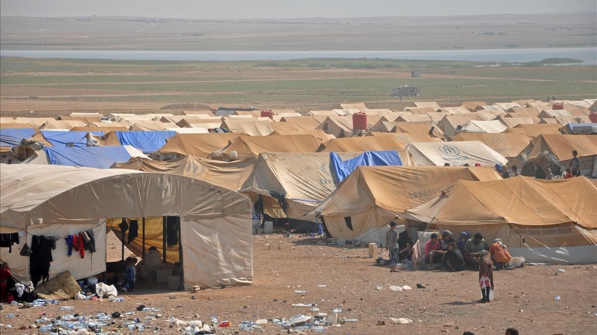 Desplazados sirios de Deir Ezzor, en un campamento a unos siete kilómetros de Arisha, en la provincia vecina de Hasakeh, el 13 de agost.